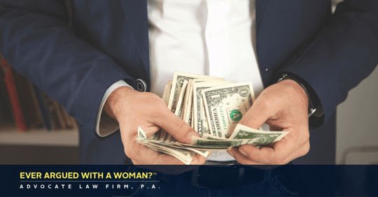 man holding money in his hands